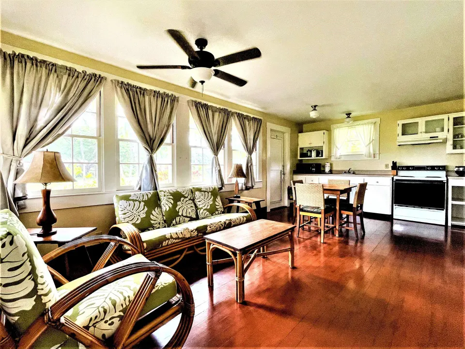 Coast Cottage living room and kitchen at Waimea Plantation Cottages.