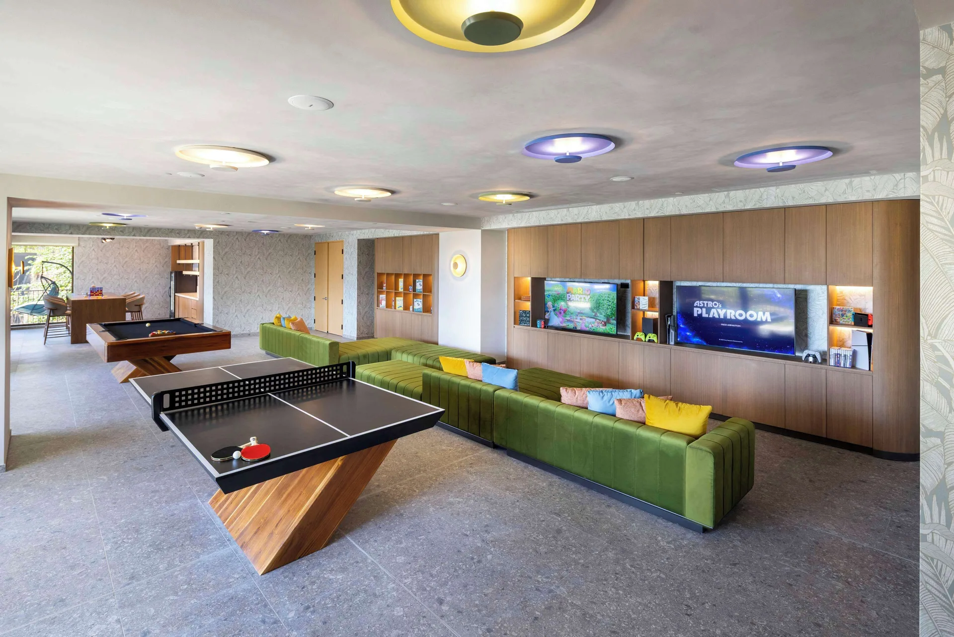 Game room with ping-pong and screens at Waldorf Astoria Costa Rica Punta Cacique.