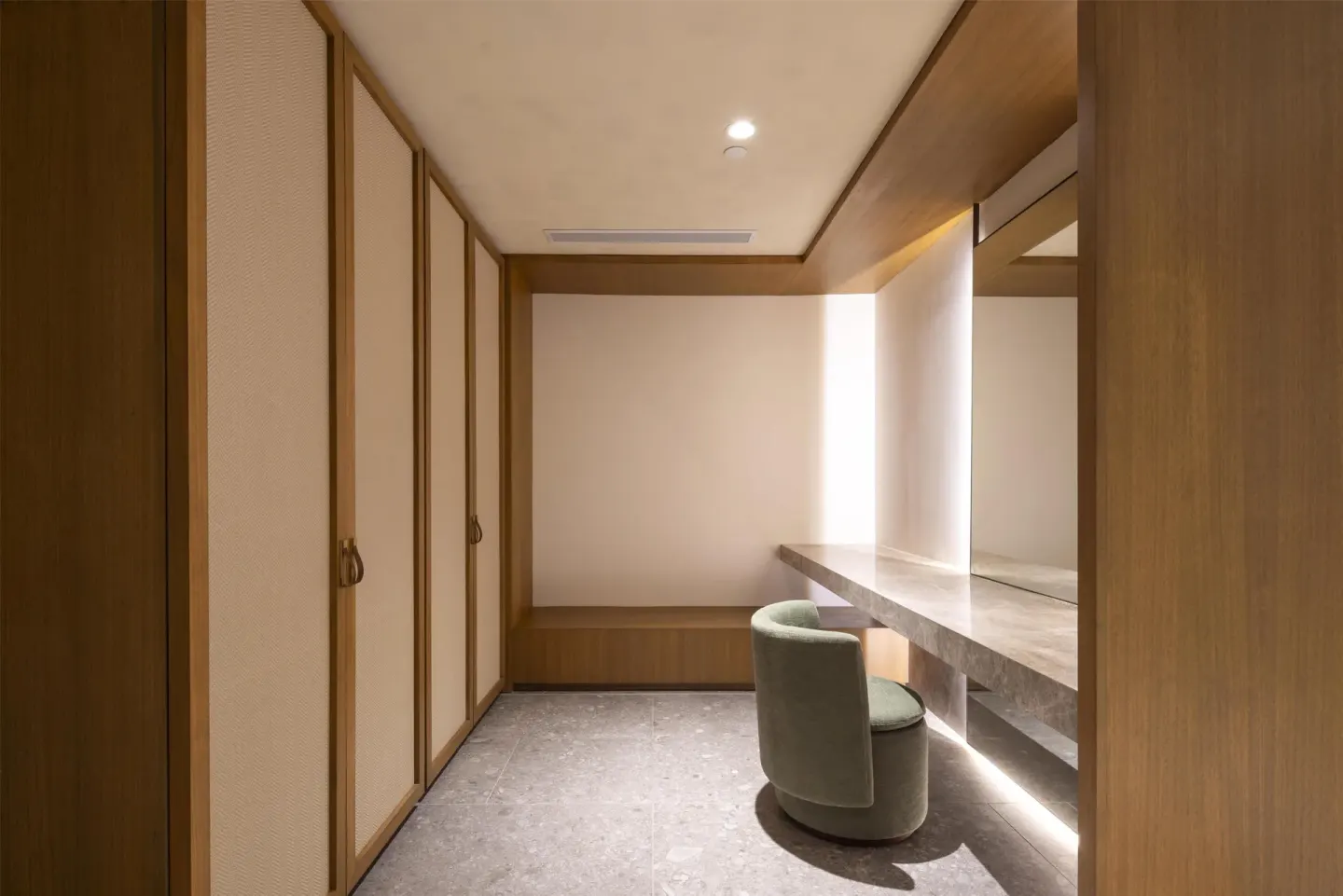 Walk-in closet and vanity area in a guest room at Waldorf Astoria Costa Rica Punta Cacique.