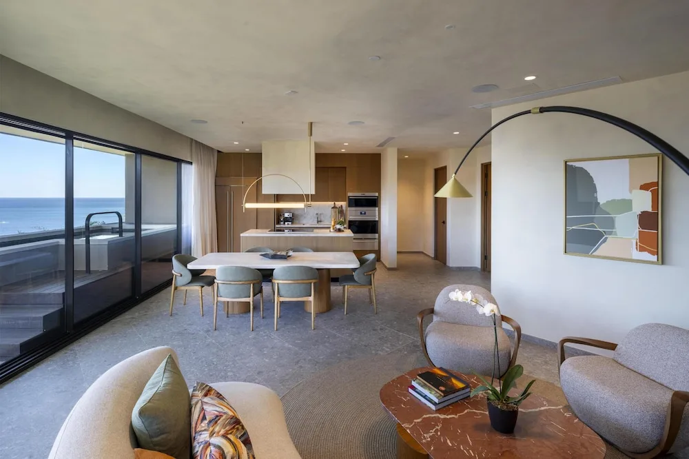 Ocean-view suite living and dining area at Waldorf Astoria Costa Rica Punta Cacique.