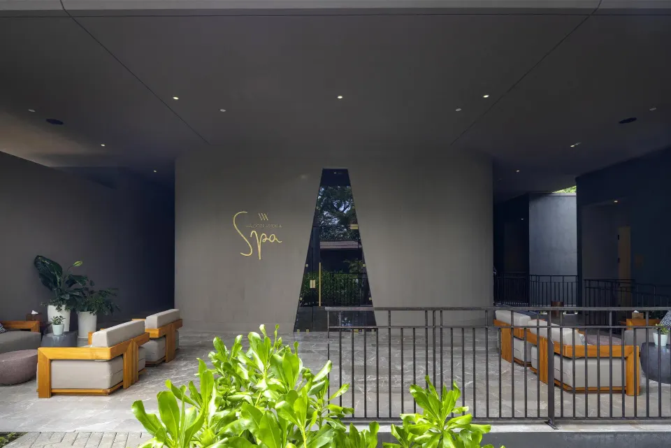 The spa entrance and outdoor seating area are shown at Waldorf Astoria Costa Rica Punta Cacique.