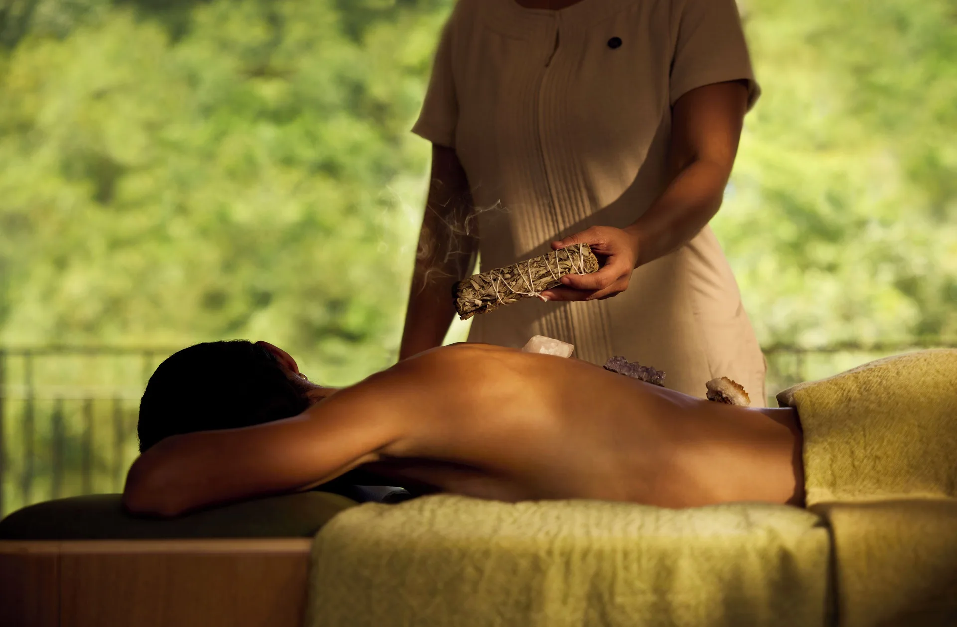 Spa treatment with aromatic bundle at Waldorf Astoria Costa Rica Punta Cacique.