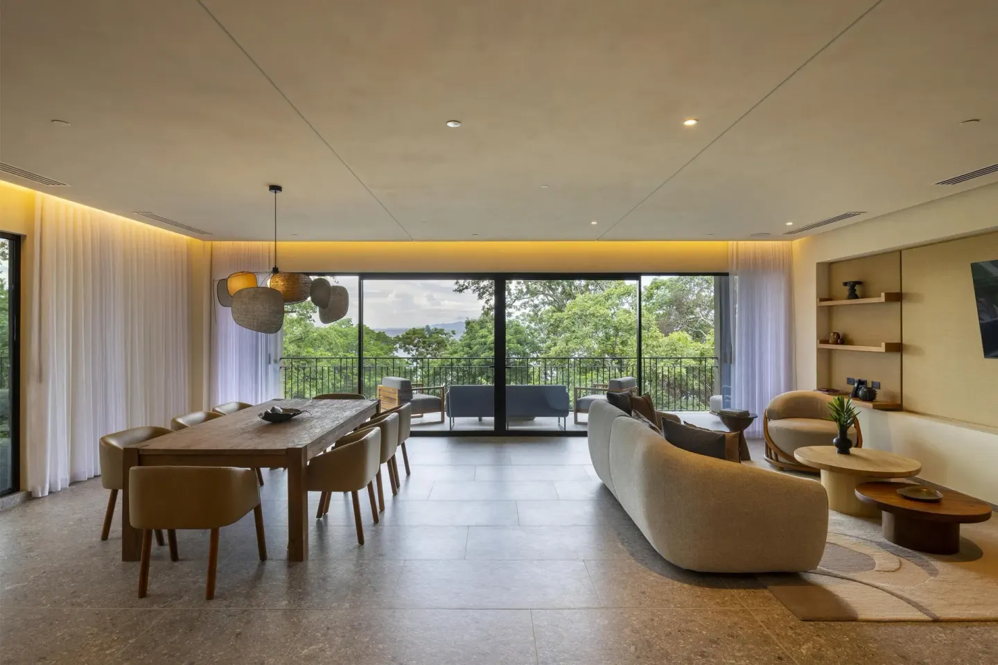 Tree-view suite living and dining room at Waldorf Astoria Costa Rica Punta Cacique.