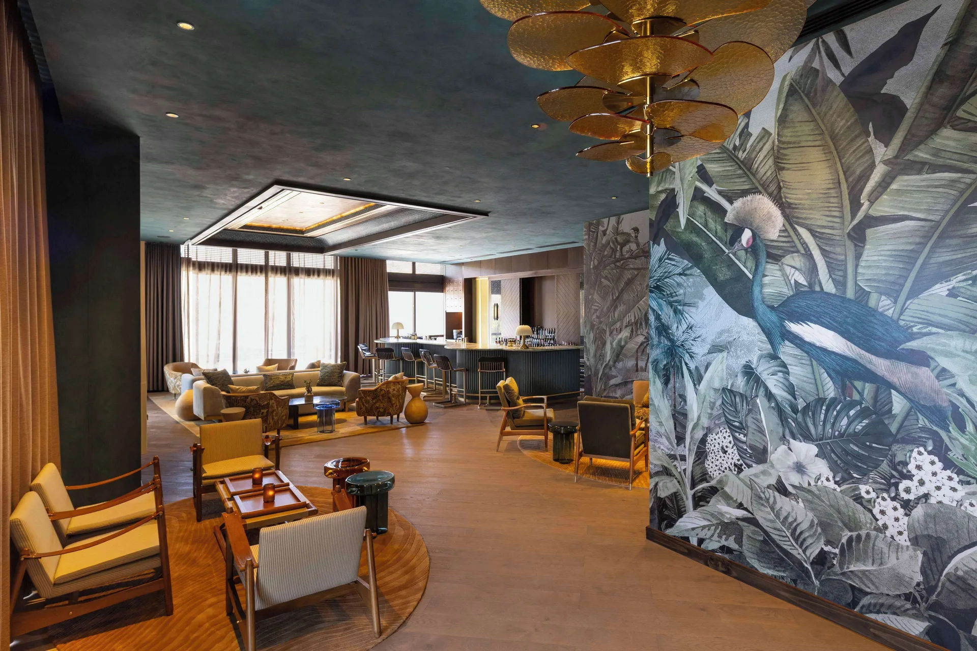 Bar lounge with tropical mural at Waldorf Astoria Costa Rica Punta Cacique.