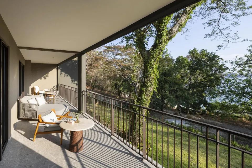 Furnished balcony of the Bahia View 1 Bedroom Suite at Waldorf Astoria Costa Rica Punta Cacique.