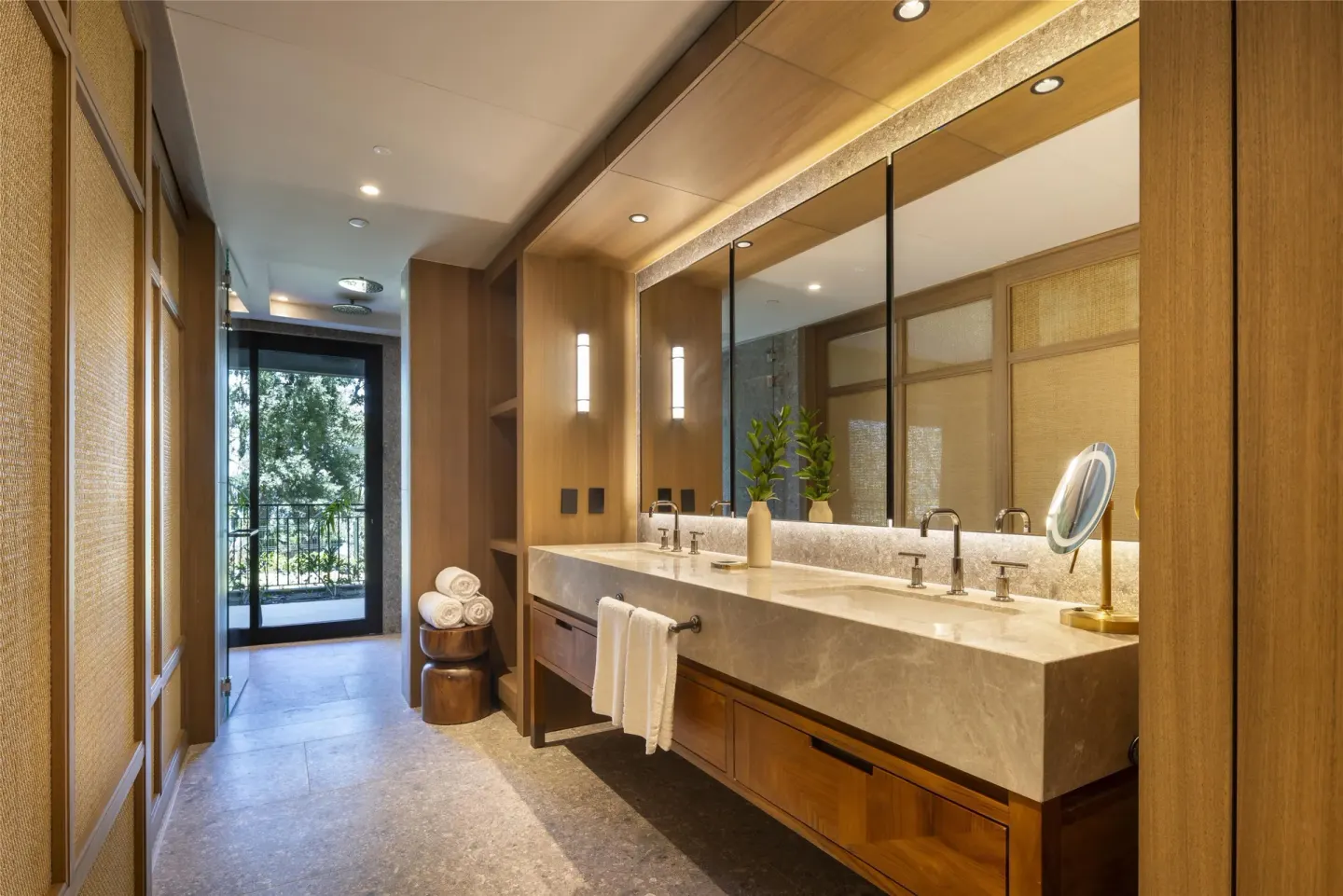 Bahia View 1 Room bathroom vanity and balcony door at Waldorf Astoria Costa Rica Punta Cacique.