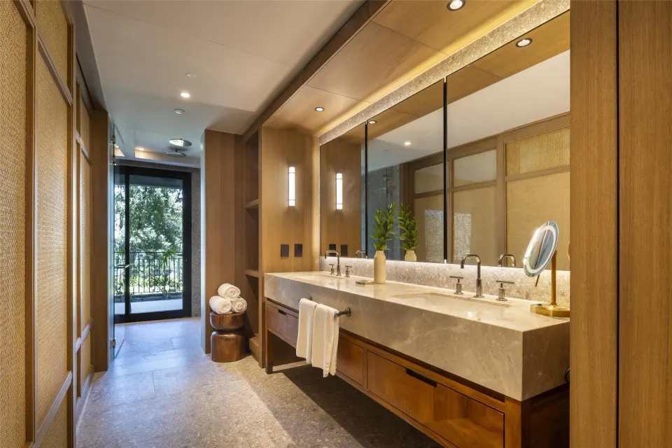 Bahia View 1 Room bathroom vanity and balcony door at Waldorf Astoria Costa Rica Punta Cacique.