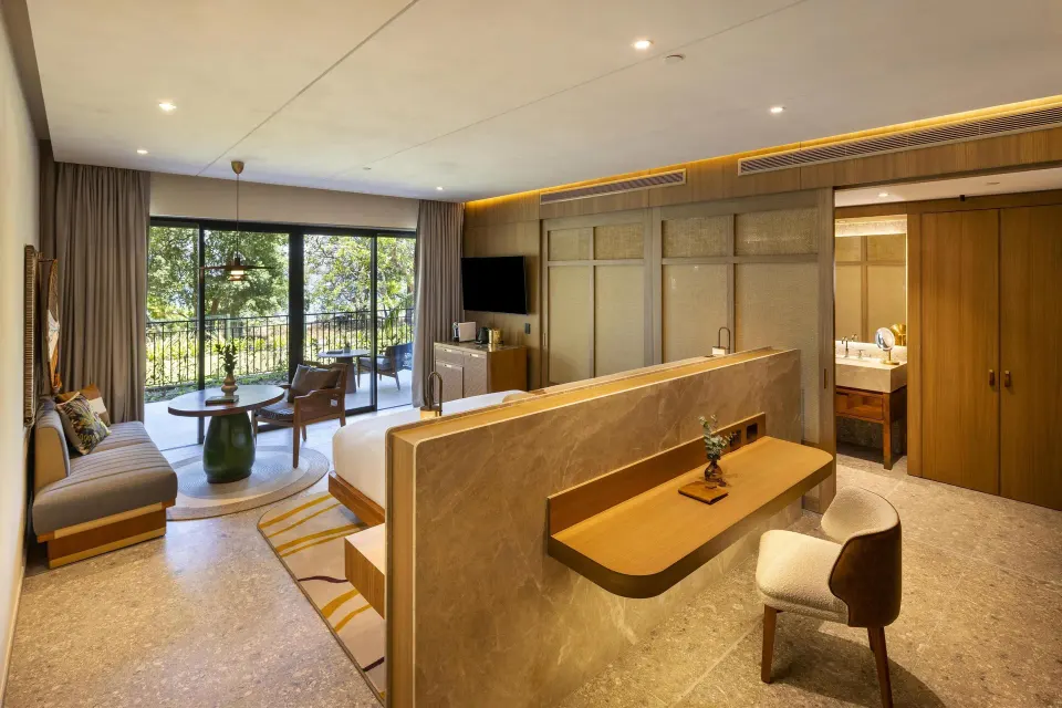 Bahia View 1 Room with king bed, desk and balcony seating at Waldorf Astoria Costa Rica Punta Cacique.