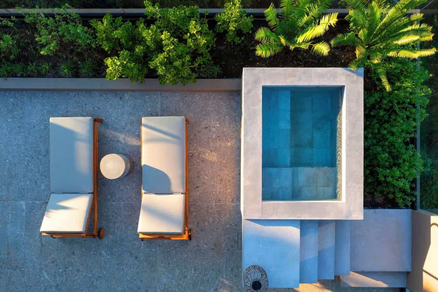Overhead view of suite plunge pool and loungers at Waldorf Astoria Costa Rica Punta Cacique.