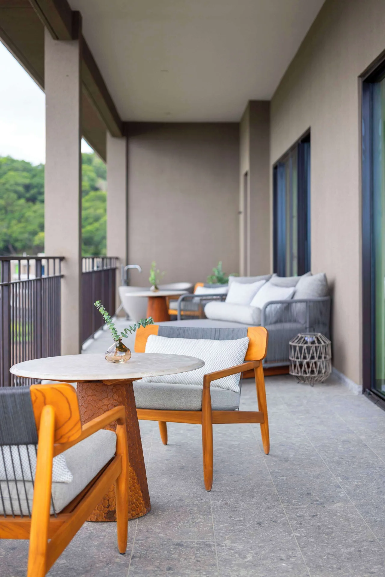 Covered suite terrace seating at Waldorf Astoria Costa Rica Punta Cacique.