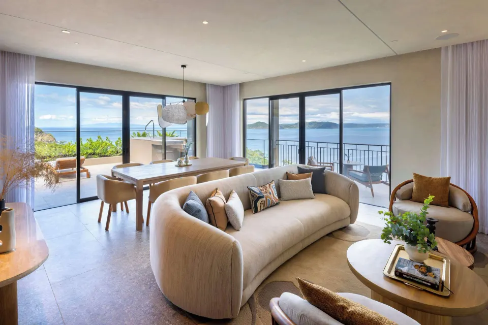 Ocean-view suite living room with terrace doors at Waldorf Astoria Costa Rica Punta Cacique.