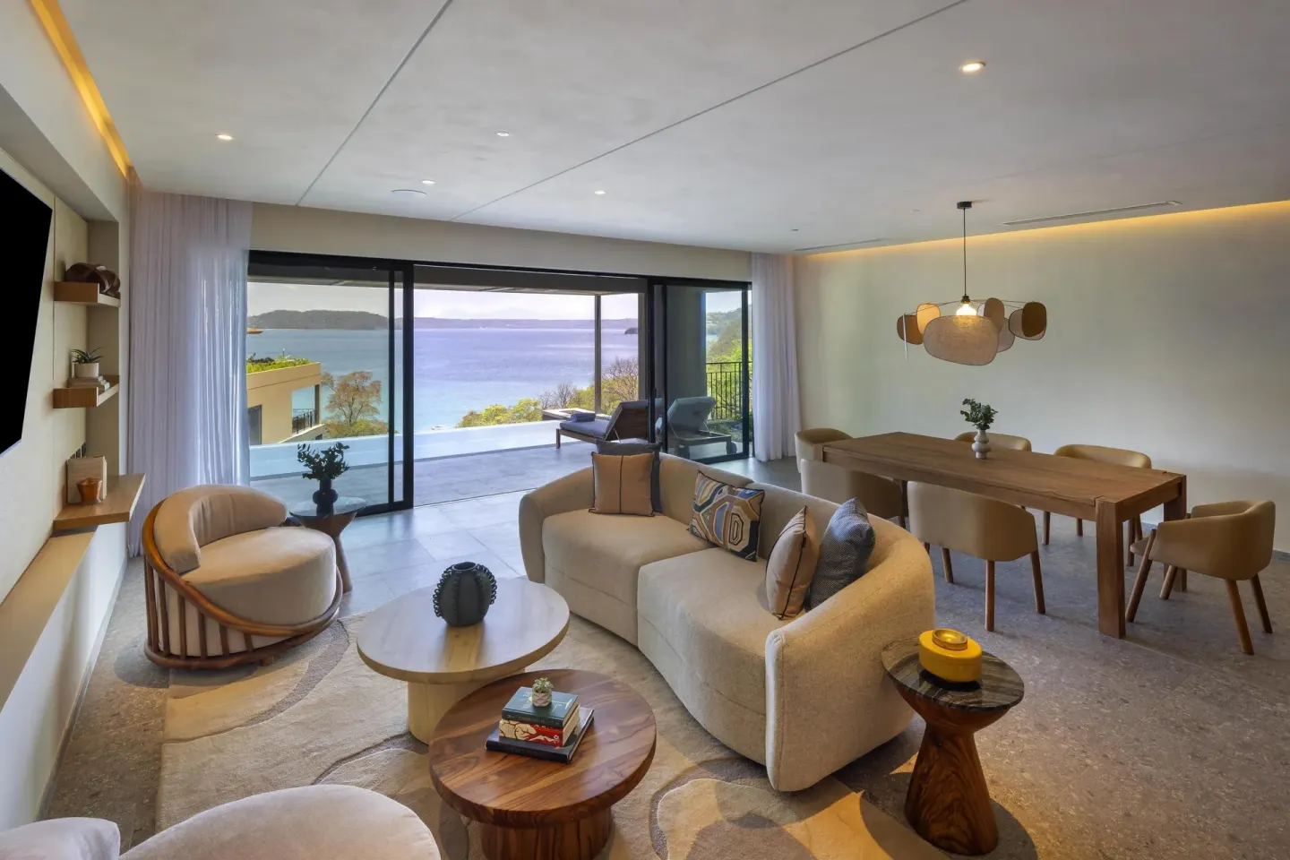 Ocean View 1 Bedroom Villa living and dining room at Waldorf Astoria Costa Rica Punta Cacique.