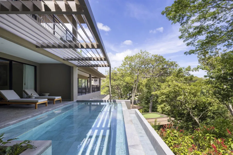 Ocean View 1 Bedroom Villa pool terrace and trees at Waldorf Astoria Costa Rica Punta Cacique.
