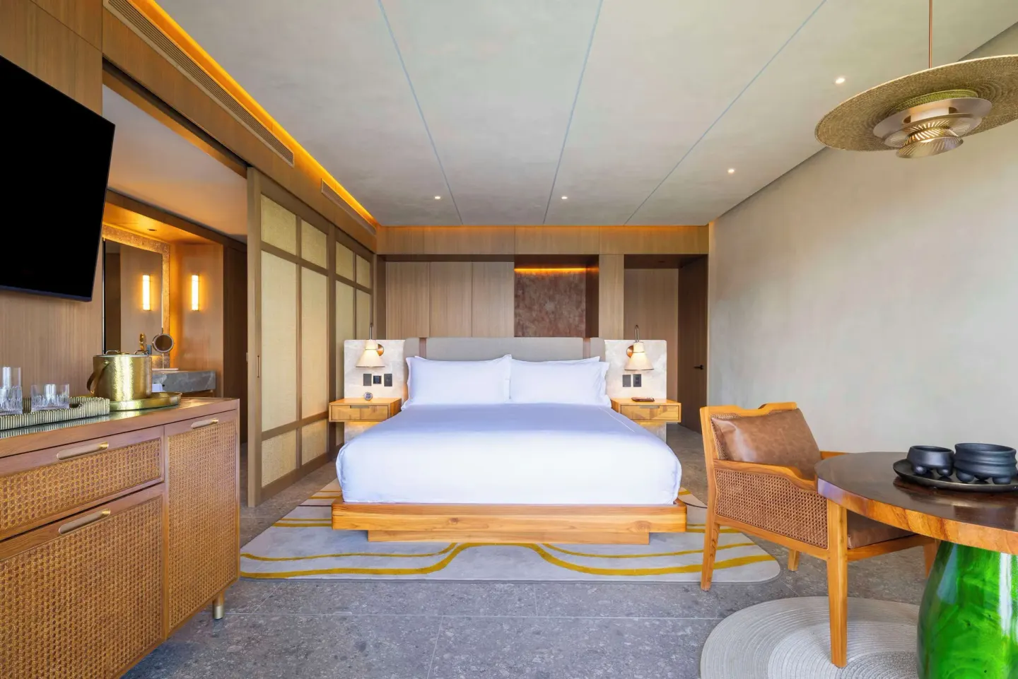 Ocean View 1 Room king bed and seating at Waldorf Astoria Costa Rica Punta Cacique.