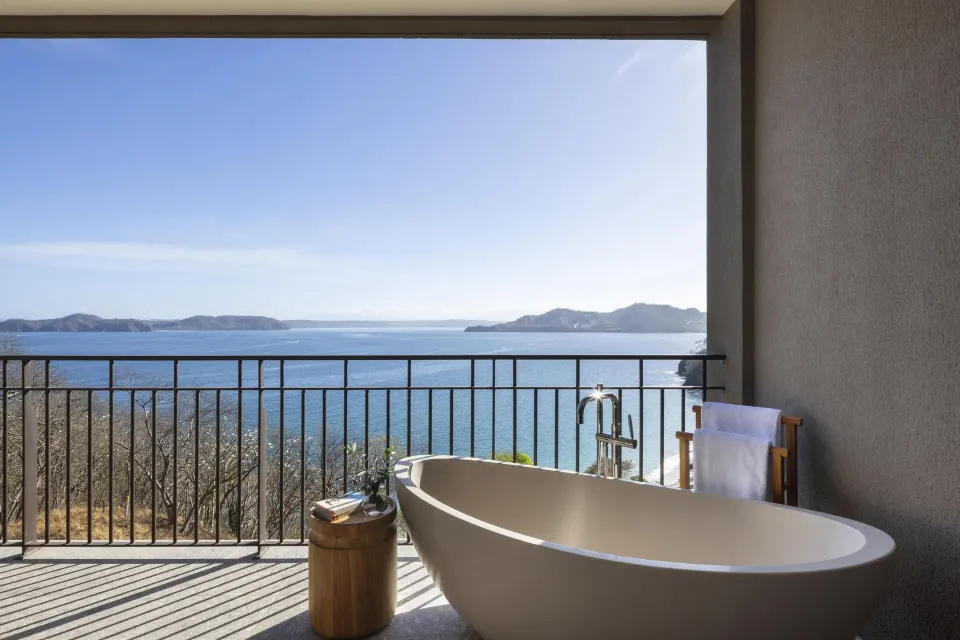 Ocean View 1 Room terrace soaking tub facing the bay at Waldorf Astoria Costa Rica Punta Cacique.
