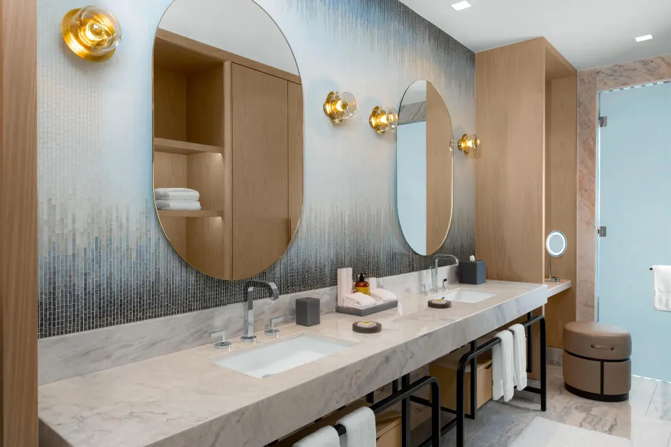 Double vanity bathroom in a Deluxe Ocean View room at Waldorf Astoria Riviera Maya.