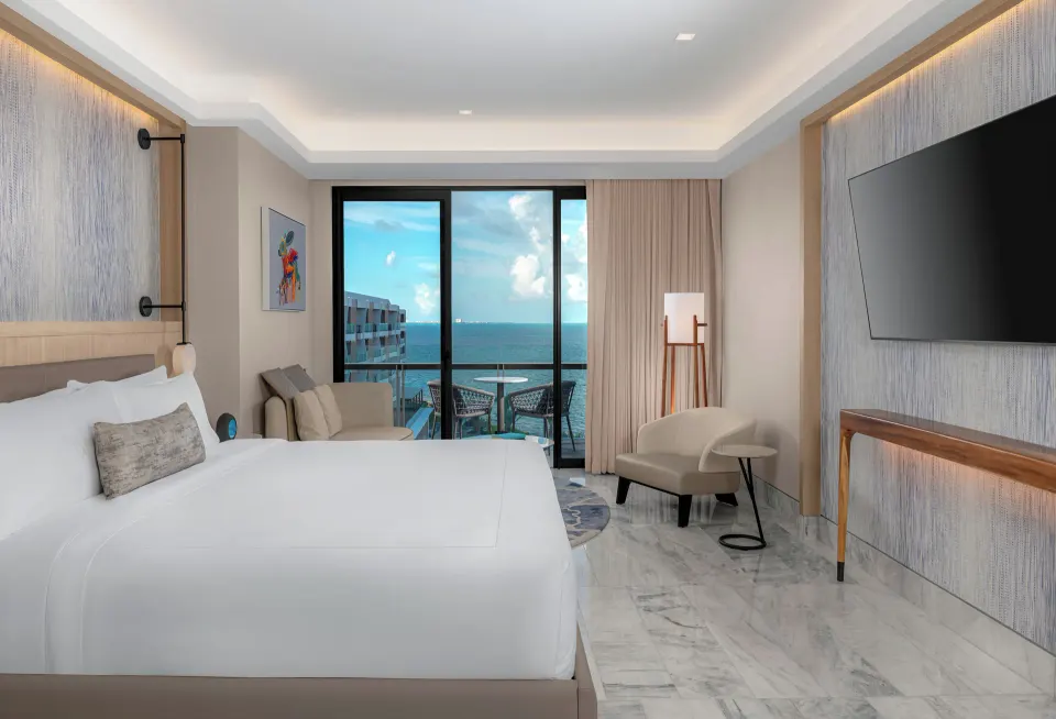 Deluxe Ocean View king room with balcony at Waldorf Astoria Riviera Maya.