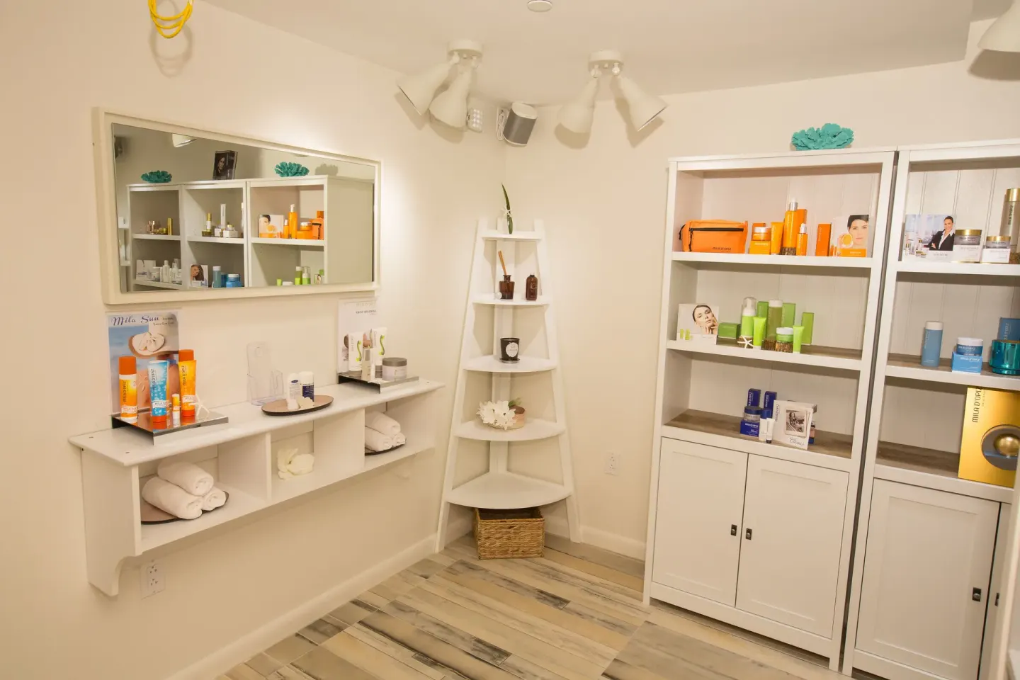 Spa retail shelves with towels and skincare products at Warwick Paradise Island.