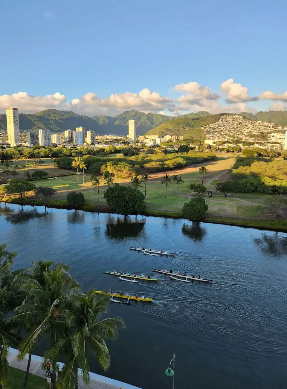 Canal, park, skyline and mountain view near Wayfinder Waikiki.