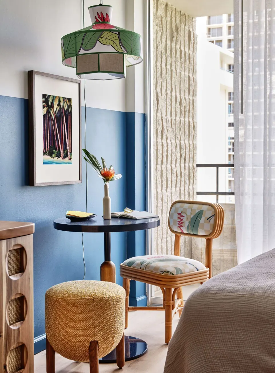 Premium Room seating nook by balcony doors at Wayfinder Waikiki.