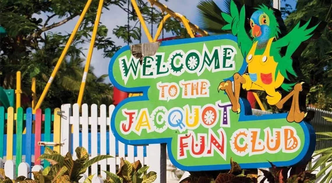 Jacquot Fun Club sign and colorful fence at Windjammer Landing Resort and Residences.