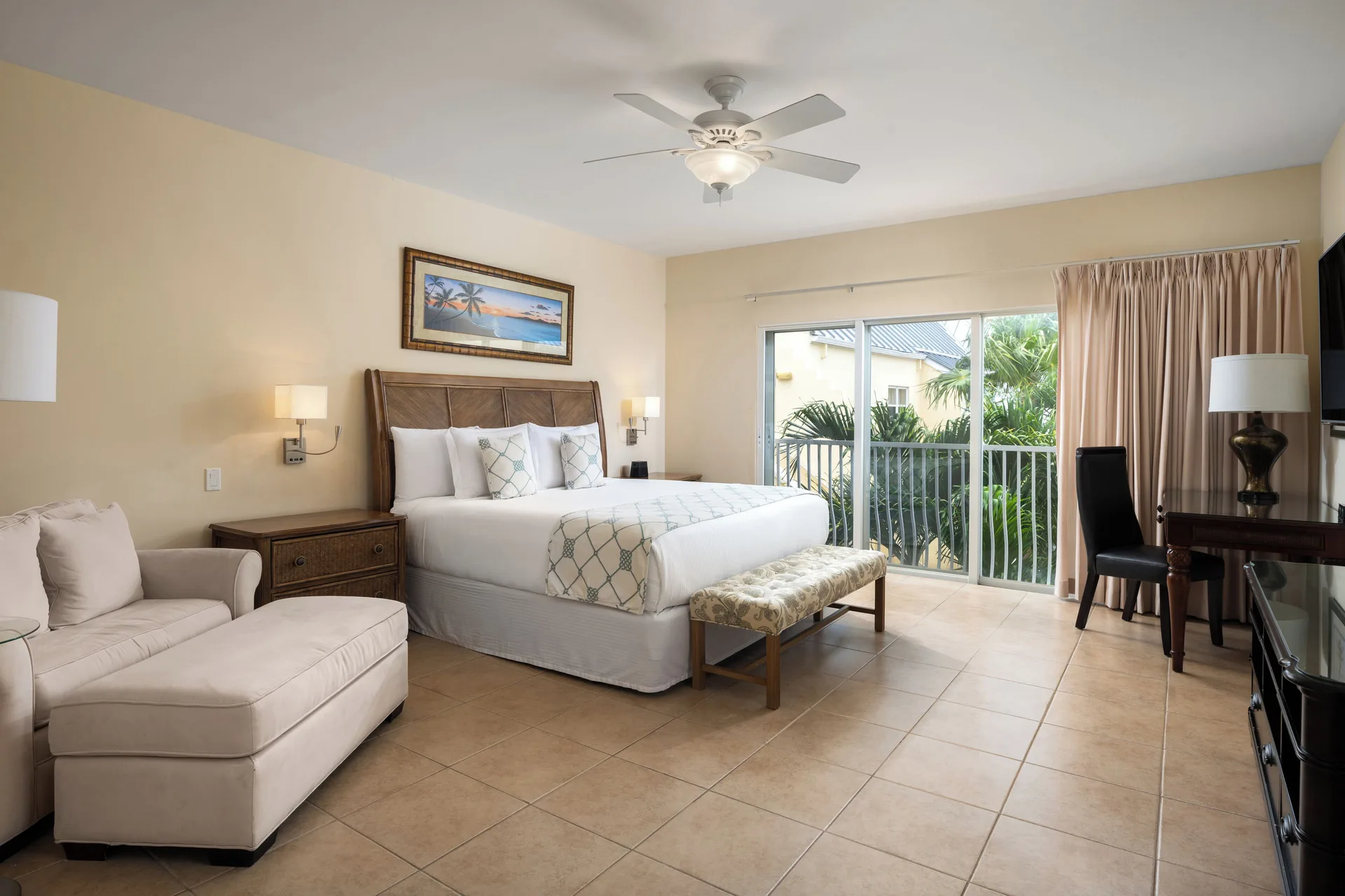 Bungalow three-bedroom king bedroom with balcony doors at Windsong on the Reef.