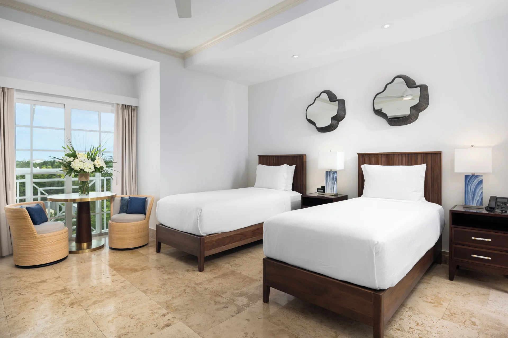Studio two twin beds with balcony seating at Windsong on the Reef.