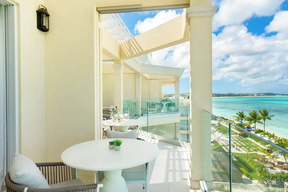 Beachfront villa terrace with ocean view at Windsong on the Reef.