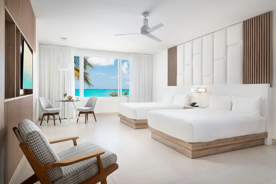 Grand Studio Oceanfront with two queen beds and sea view at Wymara Resort and Villas.