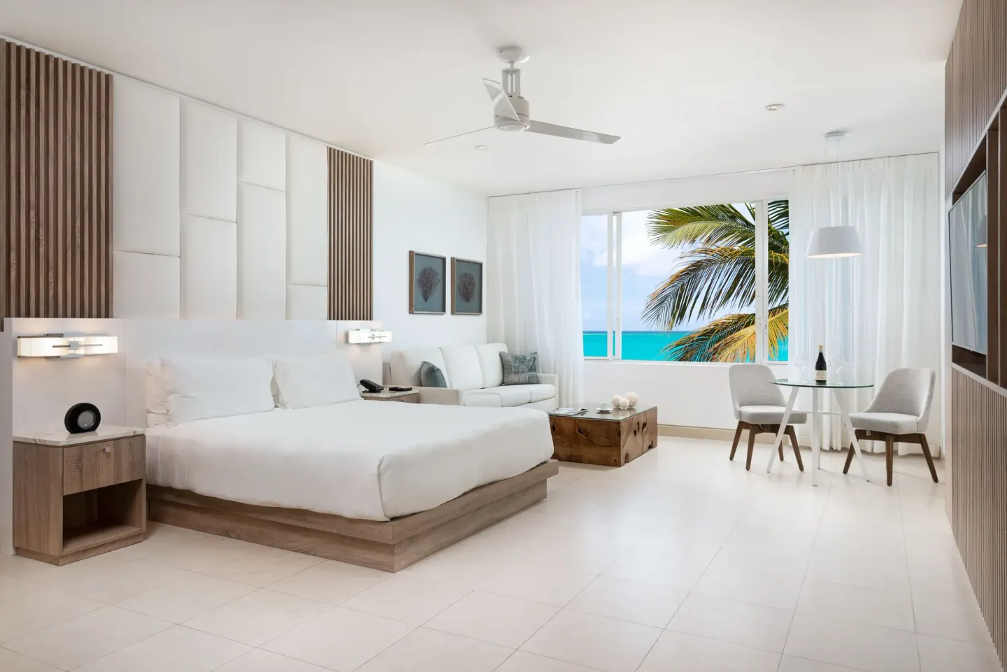 Grand Studio Oceanfront room with king bed and sea view at Wymara Resort and Villas.