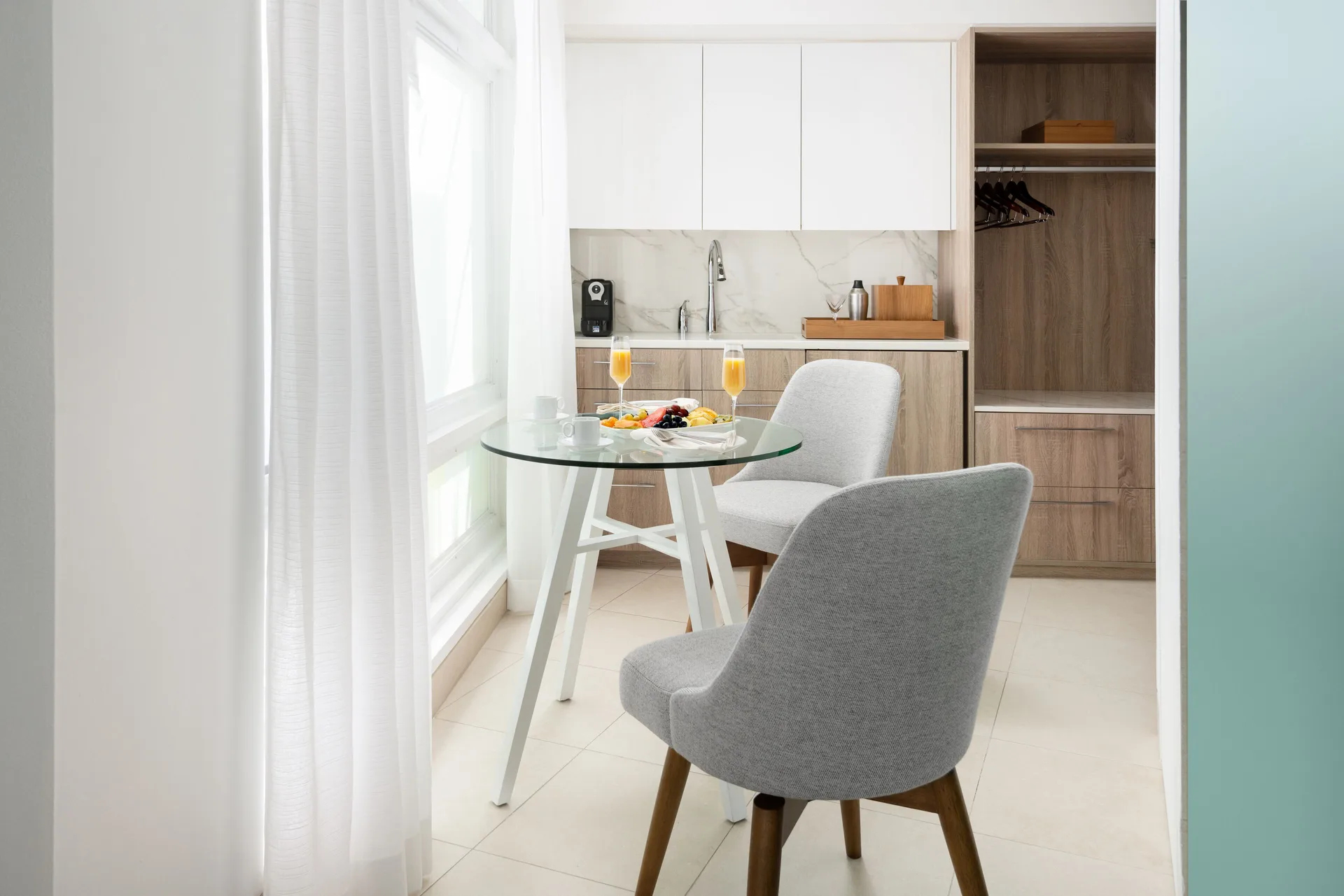 Studio Ocean View kitchenette and dining table at Wymara Resort and Villas.