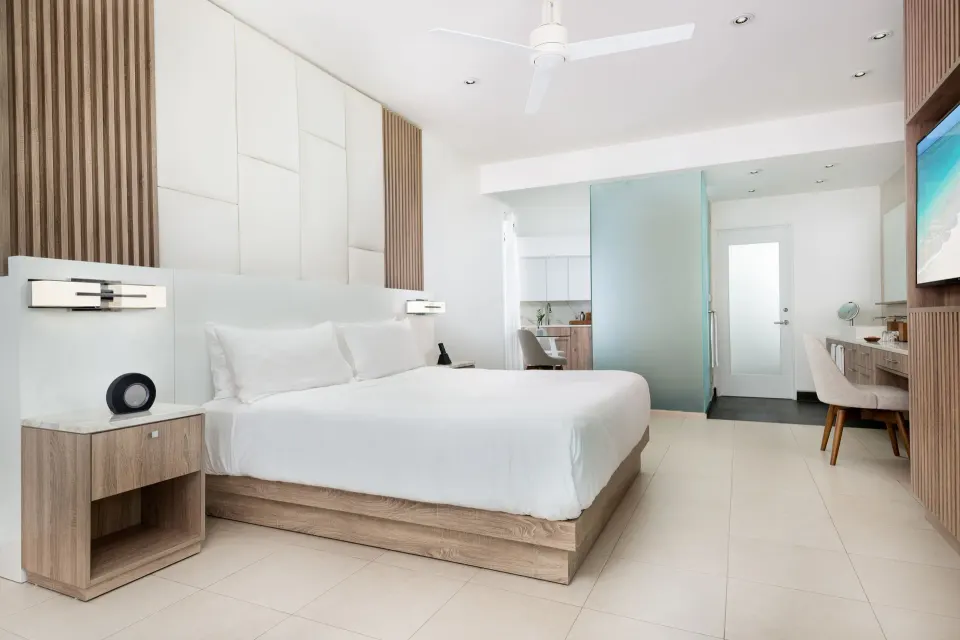 Studio Ocean View king bed and desk at Wymara Resort and Villas.