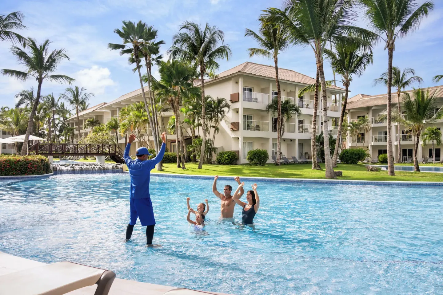 Pool activity with a family and staff member at Wyndham Alltra Punta Cana.