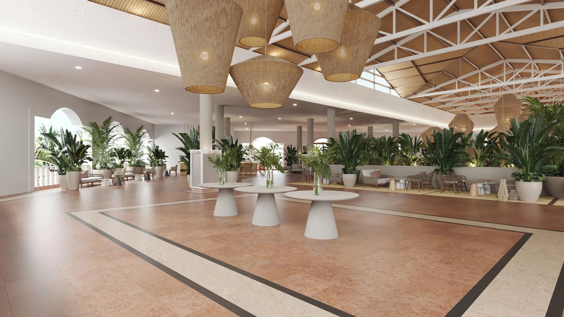 Spacious lobby with round tables, pendant lights, and greenery at Wyndham Alltra Punta Cana.