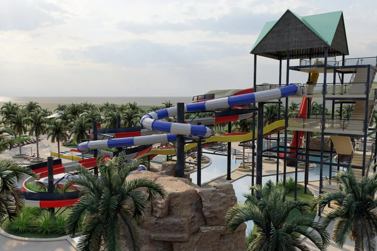 Elevated water slide tower near the palms and sea at Wyndham Alltra Punta Cana.