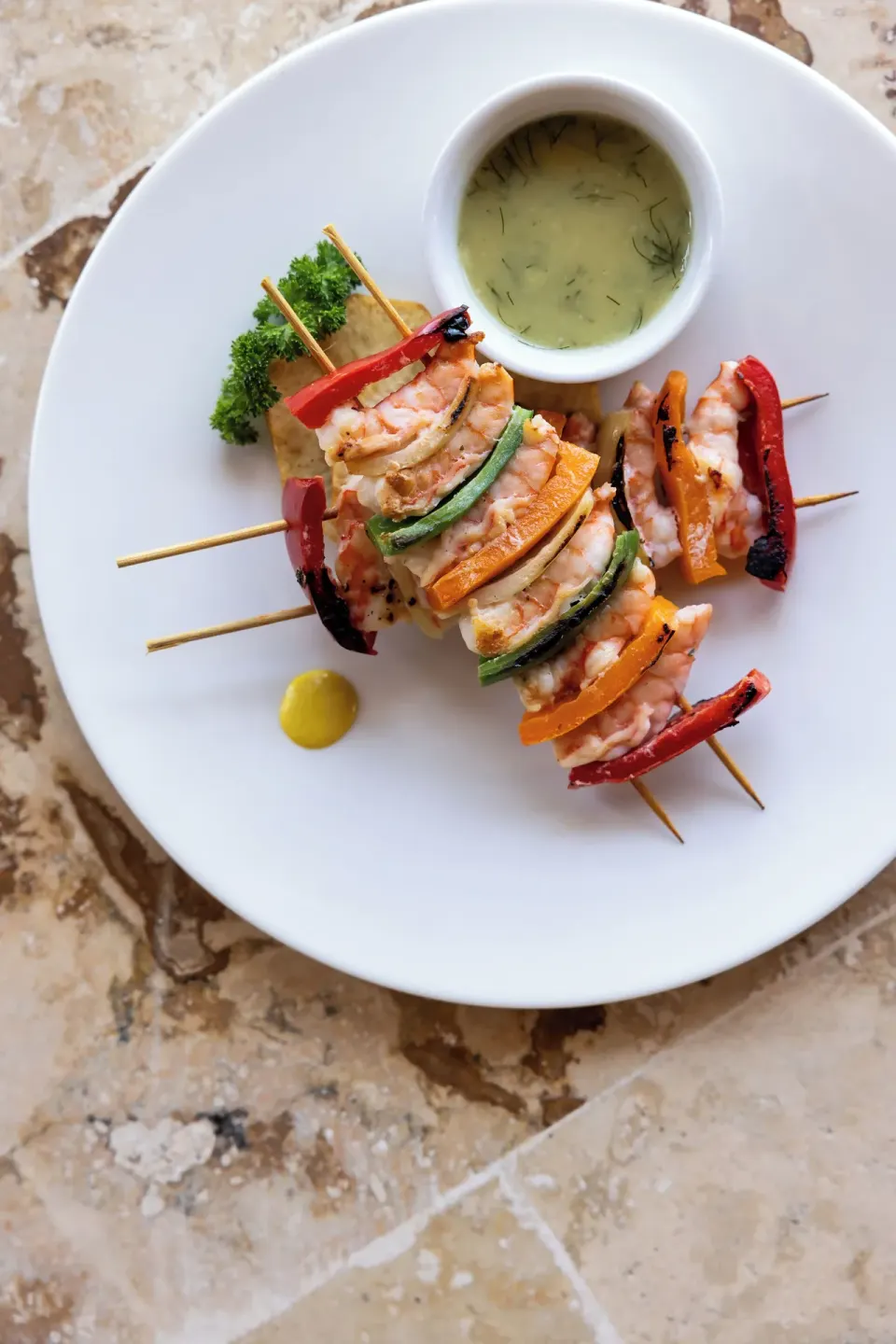 Shrimp and vegetable skewers with dipping sauce at Wyndham Alltra Punta Cana.