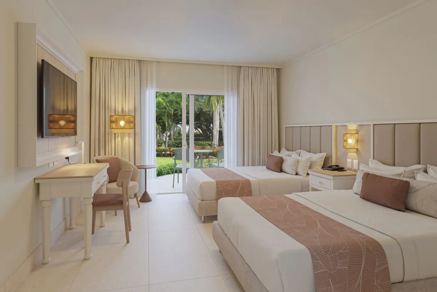 Standard tropical view room with two beds and patio at Wyndham Alltra Punta Cana.