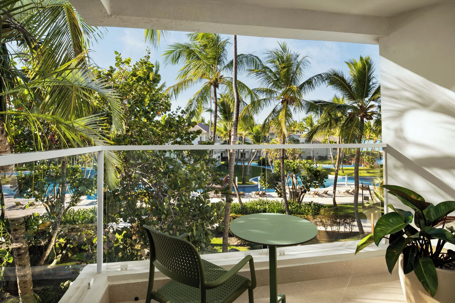 Standard Swim Out Room furnished balcony with direct pool access at Wyndham Alltra Punta Cana in the Dominican Republic.