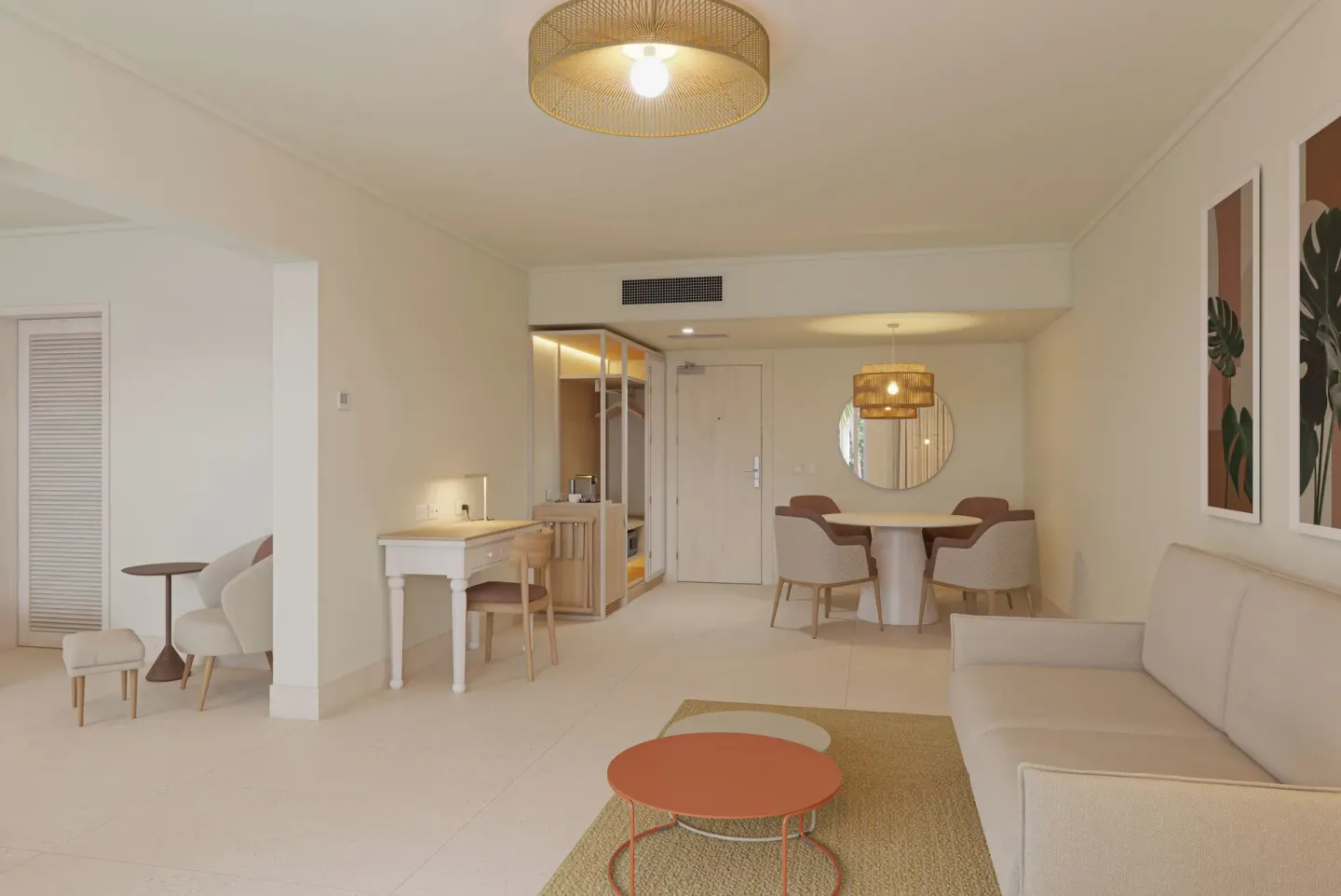 Suite living area with sofa, dining table, and vanity at Wyndham Alltra Punta Cana.