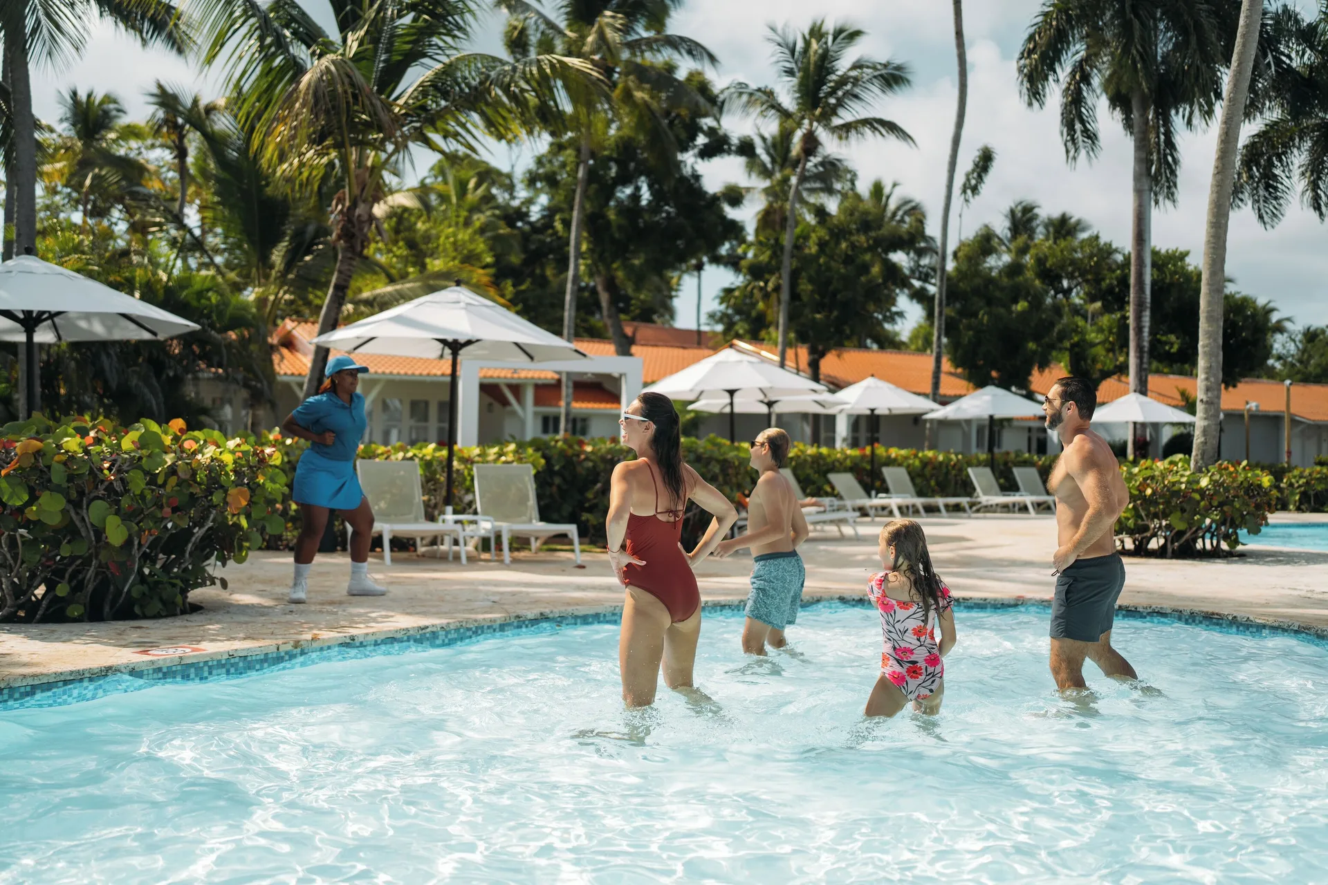 Guests joining a pool activity at Wyndham Alltra Samana Resort.