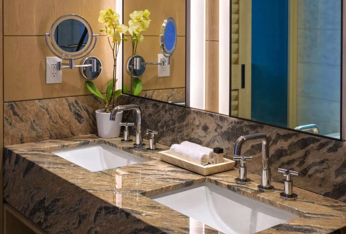 Double-sink marble vanity in a bathroom at Wyndham Grand Barbados Sam Lords Castle.