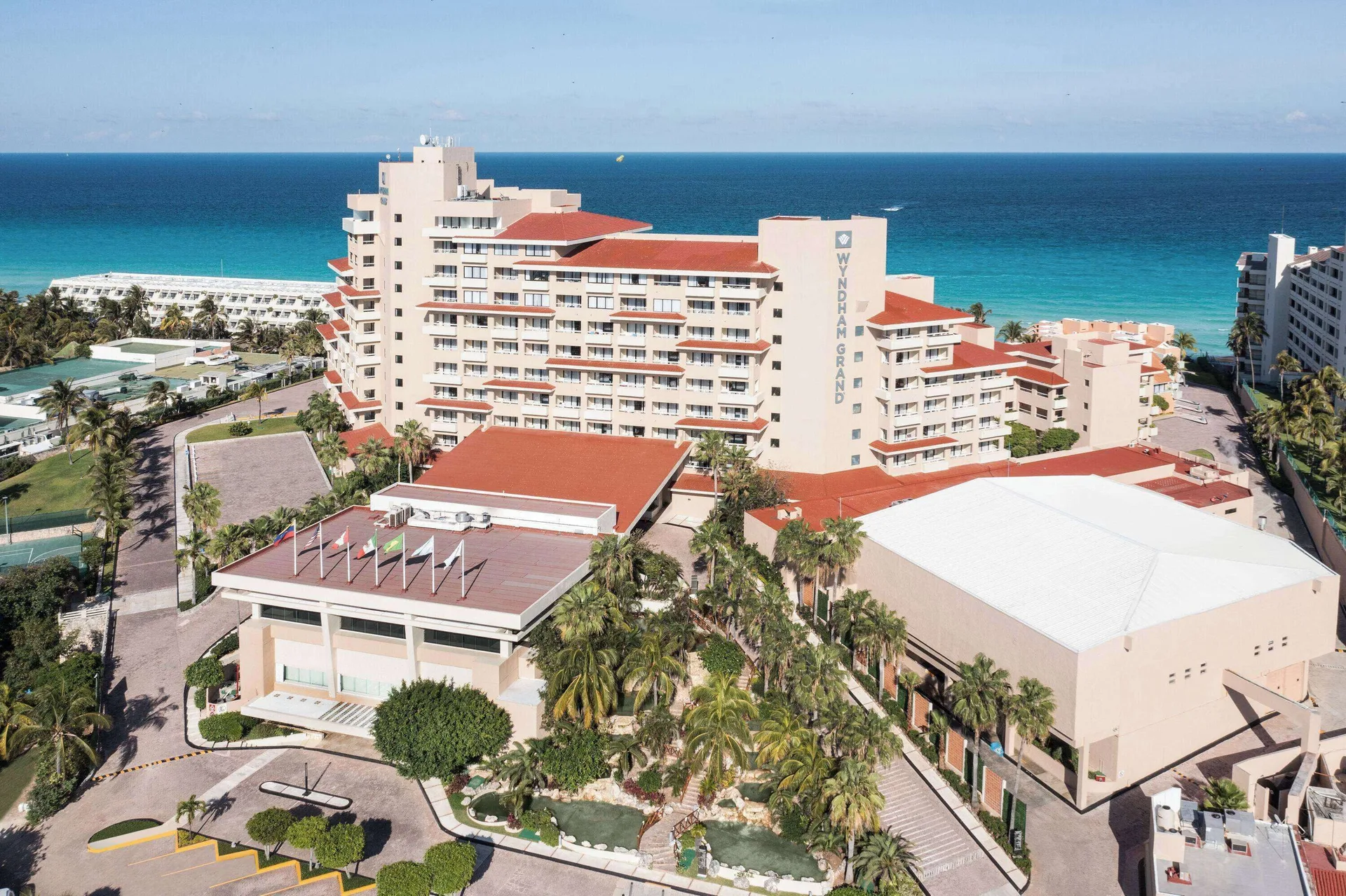 Aerial view of resort buildings and gardens at Wyndham Grand Cancun Resort & Villas.