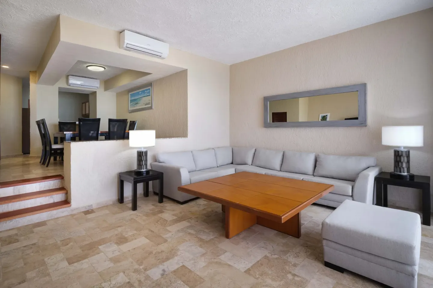 Non-smoking suite living and dining area at Wyndham Grand Cancun Resort & Villas.