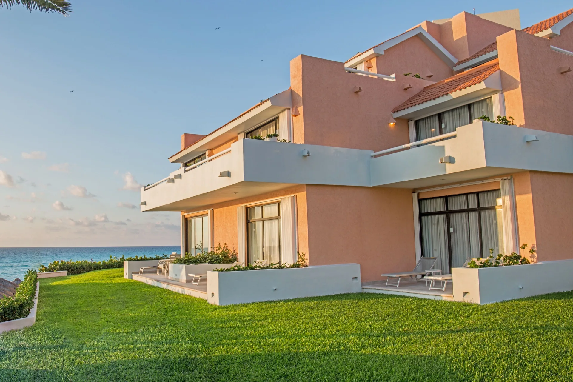 Villa building with patios and balconies at Wyndham Grand Cancun Resort & Villas.