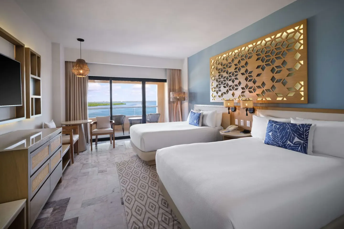Superior Lagoon View two-bed room at Wyndham Grand Cancun Resort & Villas.