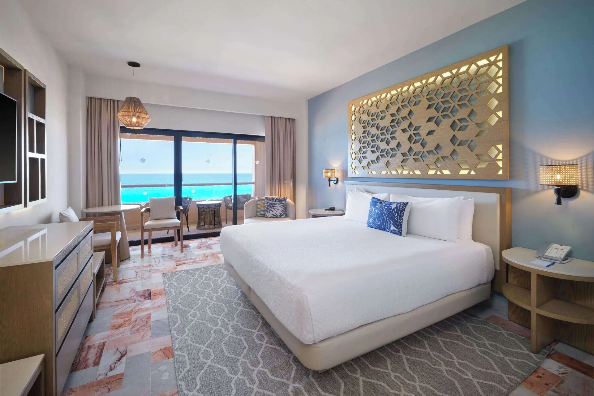 Superior Ocean View king room with balcony at Wyndham Grand Cancun Resort & Villas.