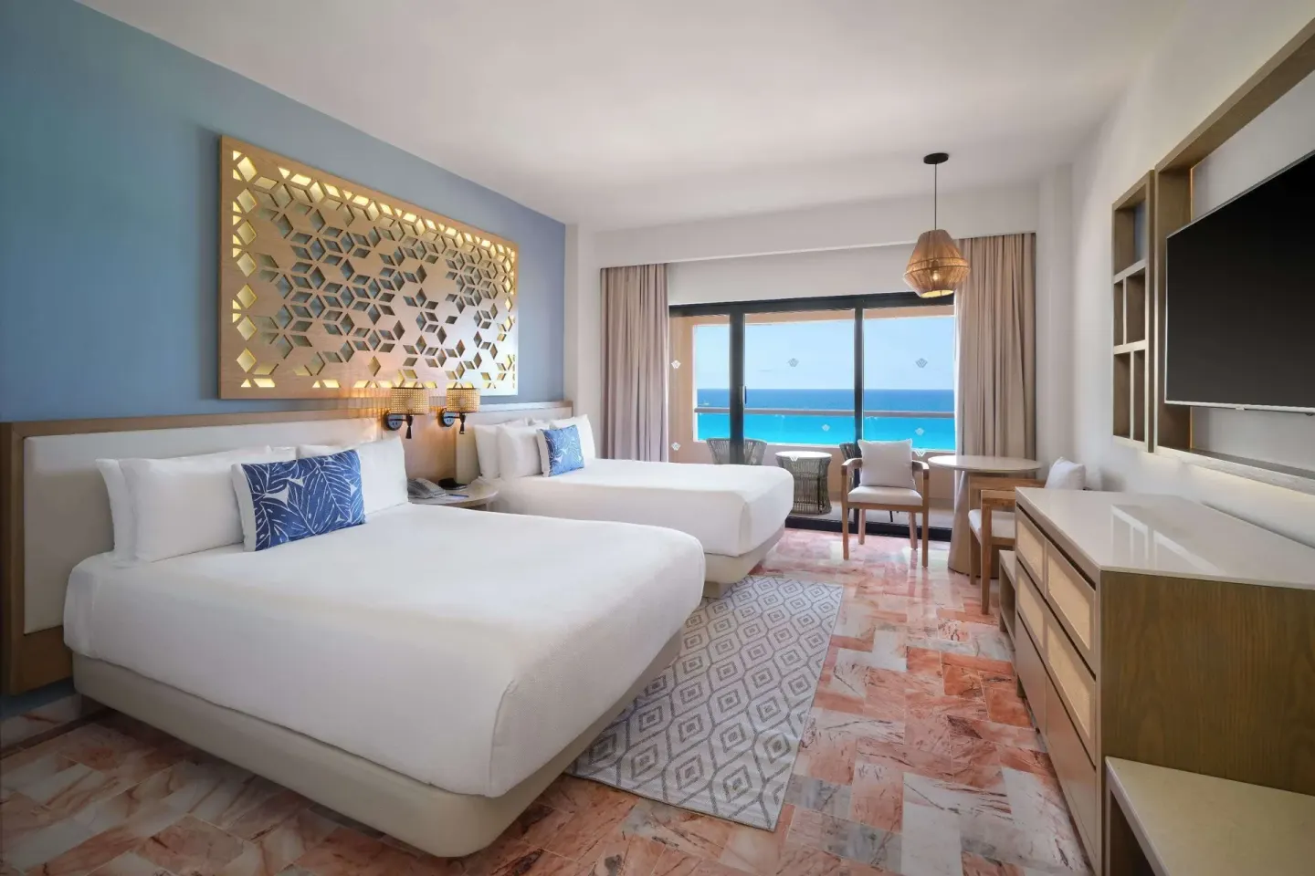 Superior Ocean View double room with two beds at Wyndham Grand Cancun Resort & Villas.