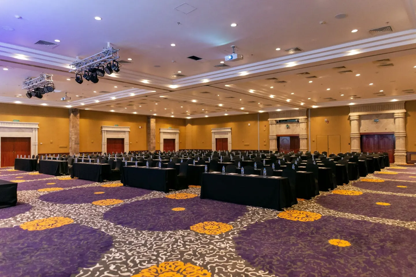 Large conference ballroom set classroom style at Wyndham Grand Cancun Resort & Villas.