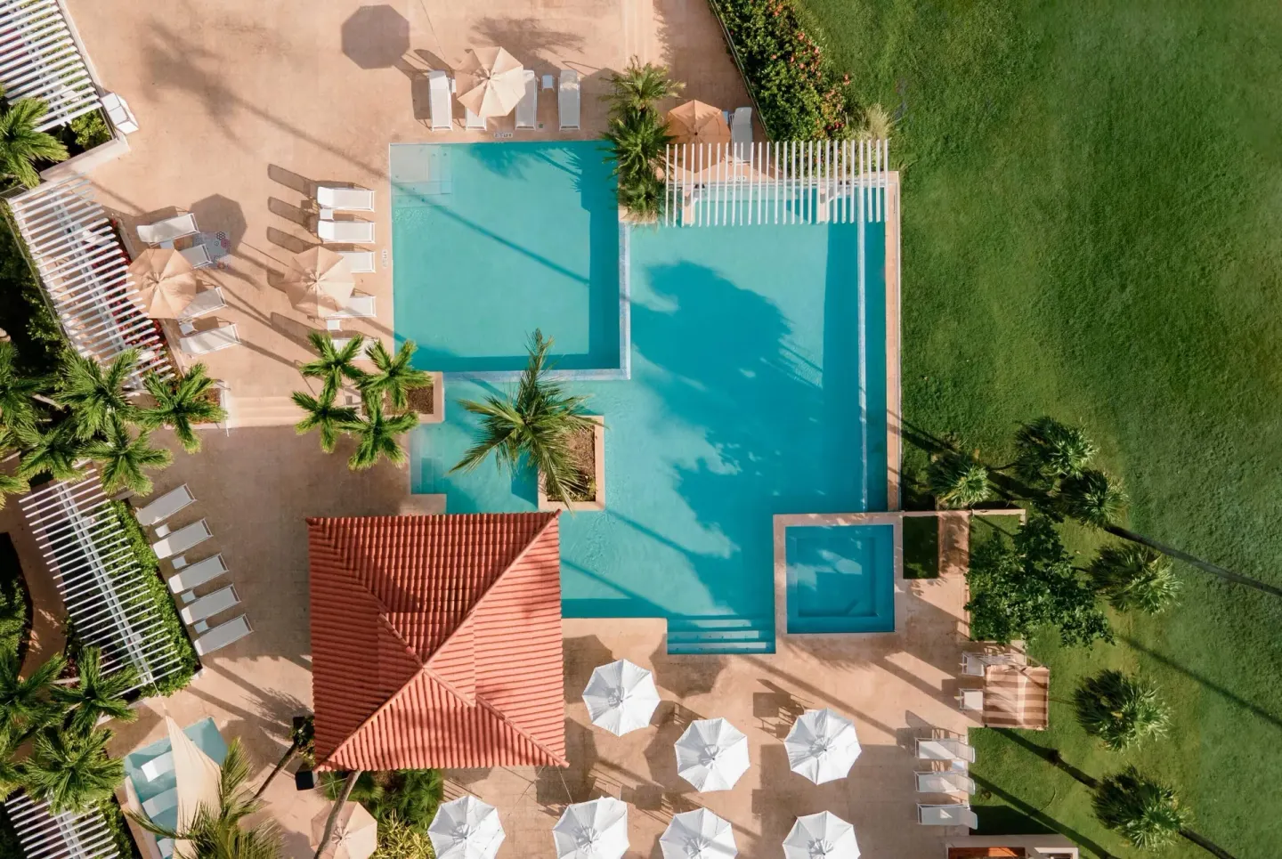 Aerial view of the rectangular pool deck at Wyndham Palmas Beach and Golf Boutique Resort.