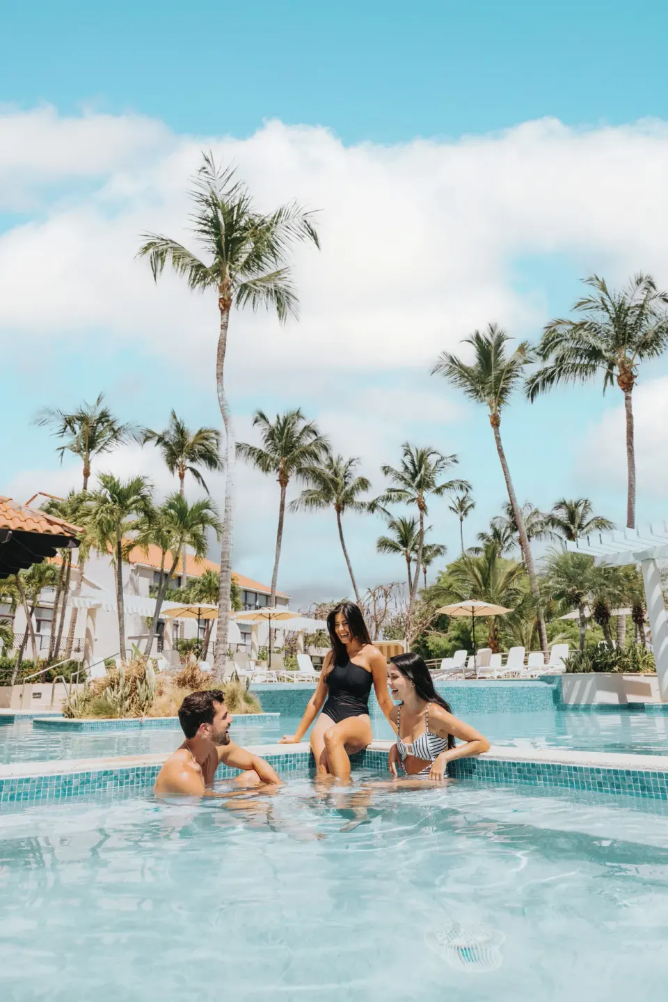 Guests gathered in the resort pool at Wyndham Palmas Beach and Golf Boutique Resort.